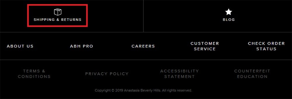 Anastasia Beverly Hills website footer with Shipping and Returns Policy link highlighted