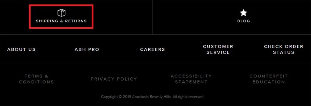 Anastasia Beverly Hills website footer with Shipping and Returns Policy link highlighted